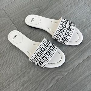 WORN ONCE: Fendi two-tone interwoven flat sandals